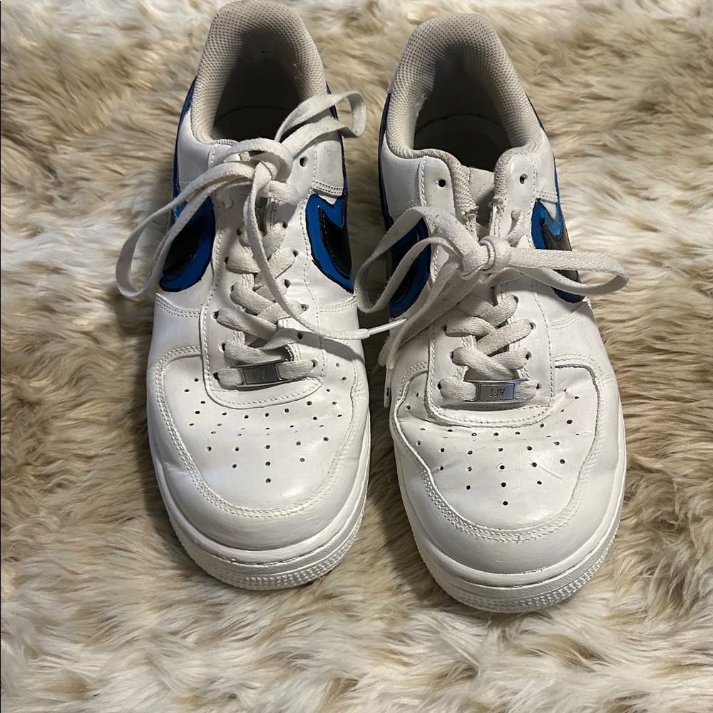 Nike white blue and black swoosh. Repainted with Angelus leather paint.